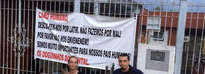 Faixa em portão pede para não envenenar cachorros